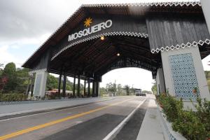 a nogales sign on a bridge over a road at Praias da Amazônia in Belém
