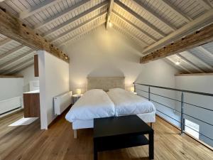 Giường trong phòng chung tại Ry de Belle Rose +50 ảnh