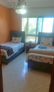 En eller flere senge i et værelse på Feels Like Home, Nice Apartments In city center Close to Beach, High-Speed WI-FI