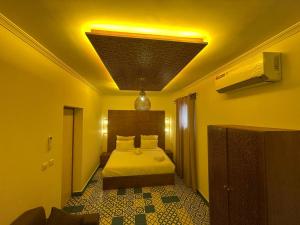 En eller flere senge i et værelse på Chefchaouen Riad