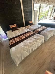 En eller flere senge i et værelse på Tiny Camp House Kurage - Vacation STAY 65999v