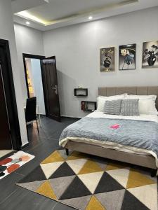 En eller flere senge i et værelse på résidence Manolie + 11 billeder