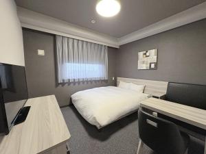 TV a/nebo společenská místnost v ubytování Hotel Route-Inn Dai-ni Nishinasuno