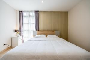 Postel nebo postele na pokoji v ubytování Spacious 3BR near Impact, Don Mueang Airport & Pink Line MRT