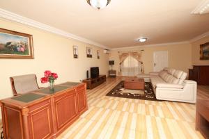 TV a/nebo společenská místnost v ubytování Complejo Caribe