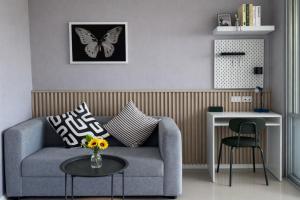 Et opholdsområde på Lumpini Seaview Jomtien Pattaya Condo 21F + 23 billeder