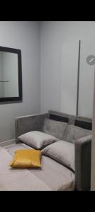 En eller flere senge i et værelse på Luxurious Villa Flic en Flac