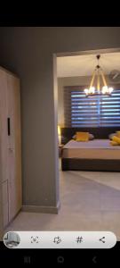 En eller flere senge i et værelse på Luxurious Villa Flic en Flac