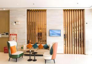 TV a/nebo společenská místnost v ubytování City Comfort Inn Nanning Beihu Bei Road Metro Station