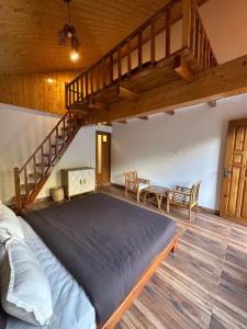 Postel nebo postele na pokoji v ubytování Bulagi House