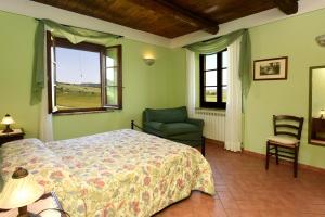Кровать или кровати в номере Agriturismo La Valle del Sole +48 фотографий