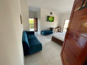 TV a/nebo společenská místnost v ubytování Kwetu Guest House Ndola