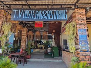 a restaurant with a sign that reads white refridgeritute at Top Views Retreat in Koh Rong Island