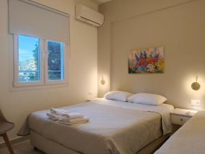 En eller flere senge i et værelse på Eva Ivoni apartments + 67 billeder