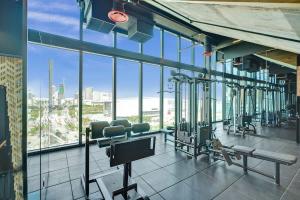a gym with a view of a city at Luxury Miami Studio 27th Floor in Miami