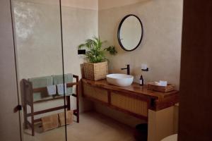 a bathroom with a sink and a mirror at Soul Temple Boutique Hotel ADULTS ONLY in Ahangama +52 photos