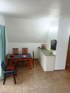 Et opholdsområde på Mullassery H Stay