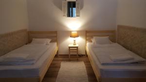 Posteľ alebo postele v izbe v ubytovaní Zrínyi 11 Apartments