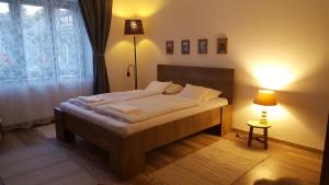 Posteľ alebo postele v izbe v ubytovaní Zrínyi 11 Apartments