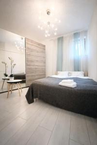 En eller flere senge i et værelse på Hill top apartment