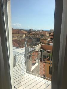 a balcony with a view of a city at Casa Maria in Salerno