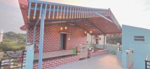 En balkon eller terrasse på Akshay Sweet Home Stay