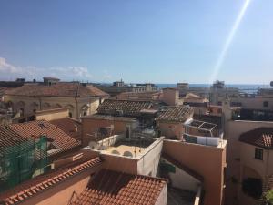 a view of roofs of buildings in a city at Casa Maria in Salerno