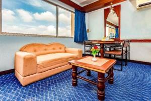 Et opholdsområde på OYO 441 Grand Thara Hotel