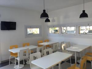 En restaurang eller annat matställe på Première Classe Rennes sud Est