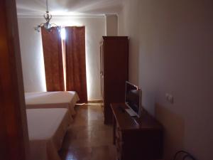 Postel nebo postele na pokoji v ubytování Hotel Antequera Rural Fortes La Nuit
