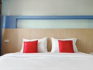 En eller flere senge i et værelse på Krabi Serene Loft + 3 billeder