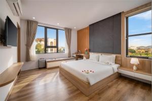 Postel nebo postele na pokoji v ubytování KLY Hotel + 64 fotografií