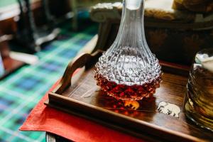 a glass vase sitting on top of a table at Alltavona House in Oban
