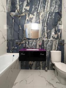 Et badeværelse på Nexpo Premium apartaments