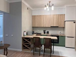 Køkken eller tekøkken på Nexpo Premium apartaments + 8 billeder