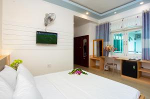 TV a/nebo společenská místnost v ubytování Gold Stars Hotel