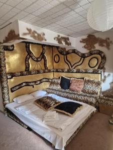 En eller flere senge i et værelse på Faraon apartmani Bg