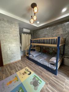 En eller flere senge i et værelse på Stylish Resort Rooms in a Private Oasis