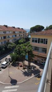 arial view of a parking lot with trees and buildings at Studio apartman - Centar in Tivat