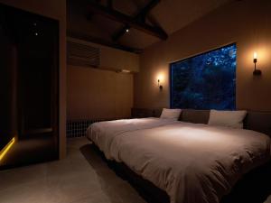 Giường trong phòng chung tại N3 ATAMI"Forest" - Vacation STAY 30932v
