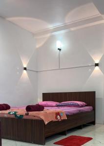 En eller flere senge i et værelse på Nobel bandarawela hotel