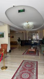 Posezení v ubytování ريلاكس إن للشقق الفندقية Relax Inn Hotel Appartment + 30 fotografií