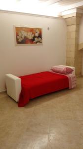 A bed or beds in a room at Casa Gianni