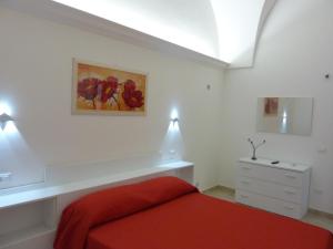 A bed or beds in a room at Casa Gianni