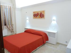 A bed or beds in a room at Casa Gianni