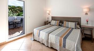 Postel nebo postele na pokoji v ubytování Hostal Tarifa -Recepcion abierta las 24h-