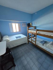 En eller flere senge i et værelse på Pousada Hostel Beach Pajuçara