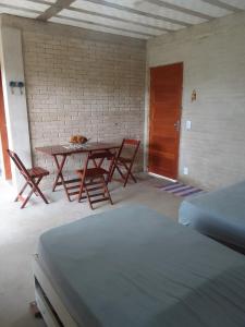 Postel nebo postele na pokoji v ubytování Kitnet in São Gonçalo do Rio das Pedras, Serro-MG