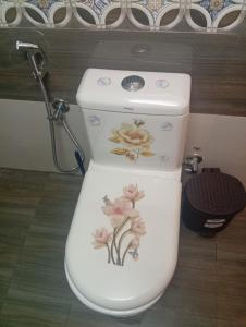 Koupelna v ubytování Gurunandanam + 40 fotografií