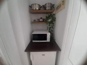 Nhà bếp/bếp nhỏ tại Apartament Blau Park con piscina comunitaria & aire acondicionado